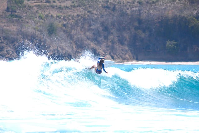 Surfer doing a turn